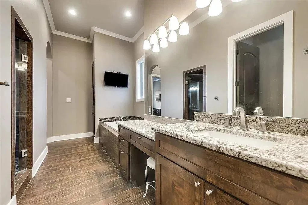 Expansive 4-Bedroom Home with Game Room, Media Room, and Courtyard Garage